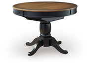 Clorazi - Oval Dining Room Butterfly Extension Table - Black / Brown - R&R Furniture Gallery (Fountain Valley, CA)