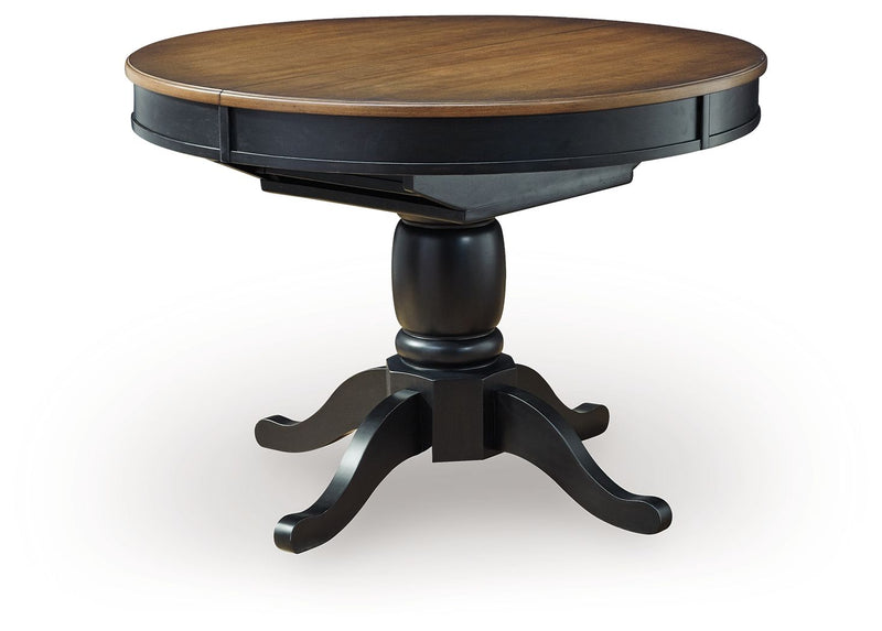 Clorazi - Oval Dining Room Butterfly Extension Table - Black / Brown - R&R Furniture Gallery (Fountain Valley, CA)
