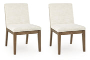 Set of two Benchcraft Marxmore dining upholstered side chairs in beige and brown with padded seats and wooden legs.