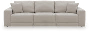 Benchcraft® Next-Gen Gaucho stationary sectional with plush cushions and modern design, shown in a spacious living room setting.