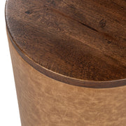 Classic Home Andra accent table with a round wooden top and sleek metal legs, ideal for living room or bedroom decor.