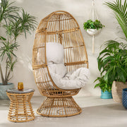 Noble House patio swivel basket egg chair with cushion, outdoor accent chair featuring woven design and plush seating.