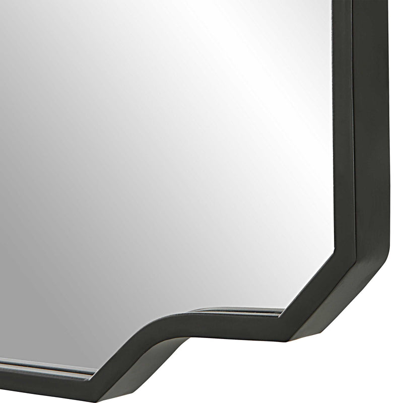 Black iron wall mirror with a sleek, minimalist frame from Uttermost's Casmus collection, designed for modern interior decor.