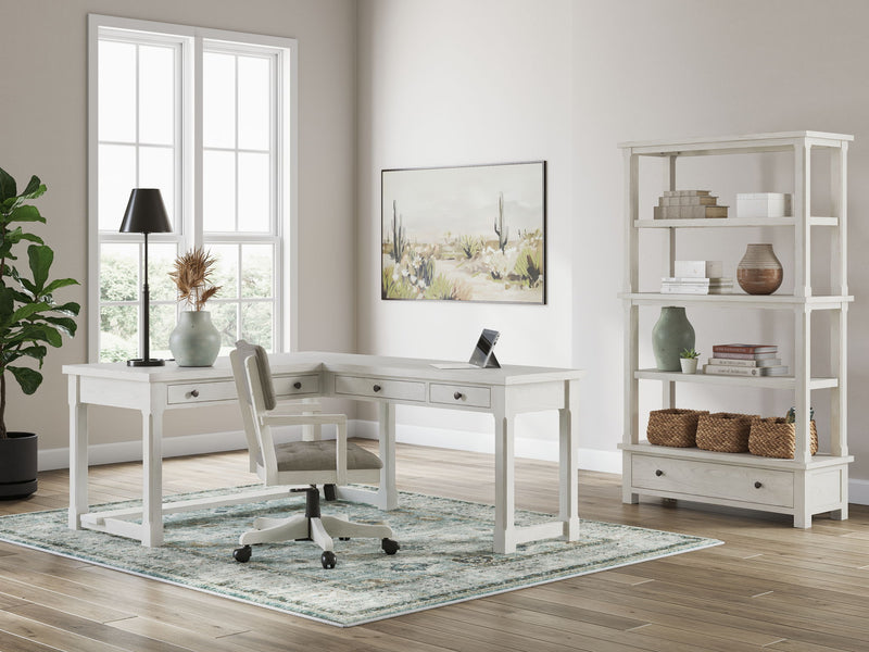 Signature Design by Ashley Robbinsdale 3-piece home office set with desk, chair, and storage cabinet in a modern workspace style.