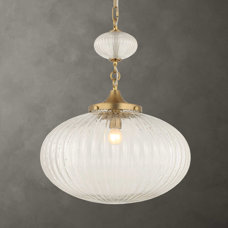Uttermost Bellaire 1-light pendant with gold finish and glass shade, hanging from a ceiling fixture in modern pendant lighting style.
