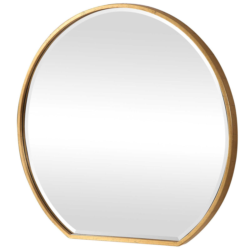 Uttermost Cabell wall mirror with a sleek, modern frame, hanging on a wall in a stylish interior setting.