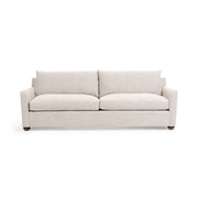 Classic Home Olivia stationary sofa with plush cushions and elegant design, perfect for living room seating.