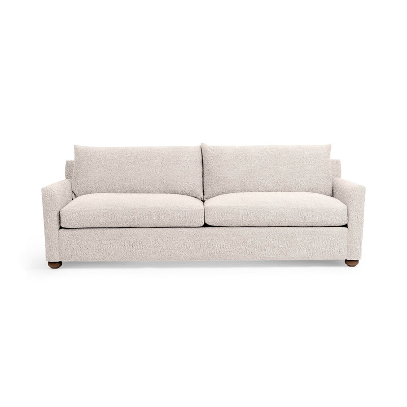 Classic Home Olivia stationary sofa with plush cushions and elegant design, perfect for living room seating.