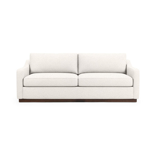 Classic Home Aspen stationary sofa with plush upholstery and modern design, shown in a cozy living room setting.