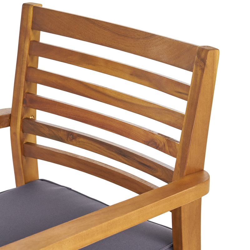 Set of two outdoor dining chairs with slat back design and acacia wood frames in gray and teak finish by Noble House