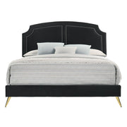 Zeena upholstered bed by ACME featuring a padded headboard and plush fabric in a modern bedroom setting.