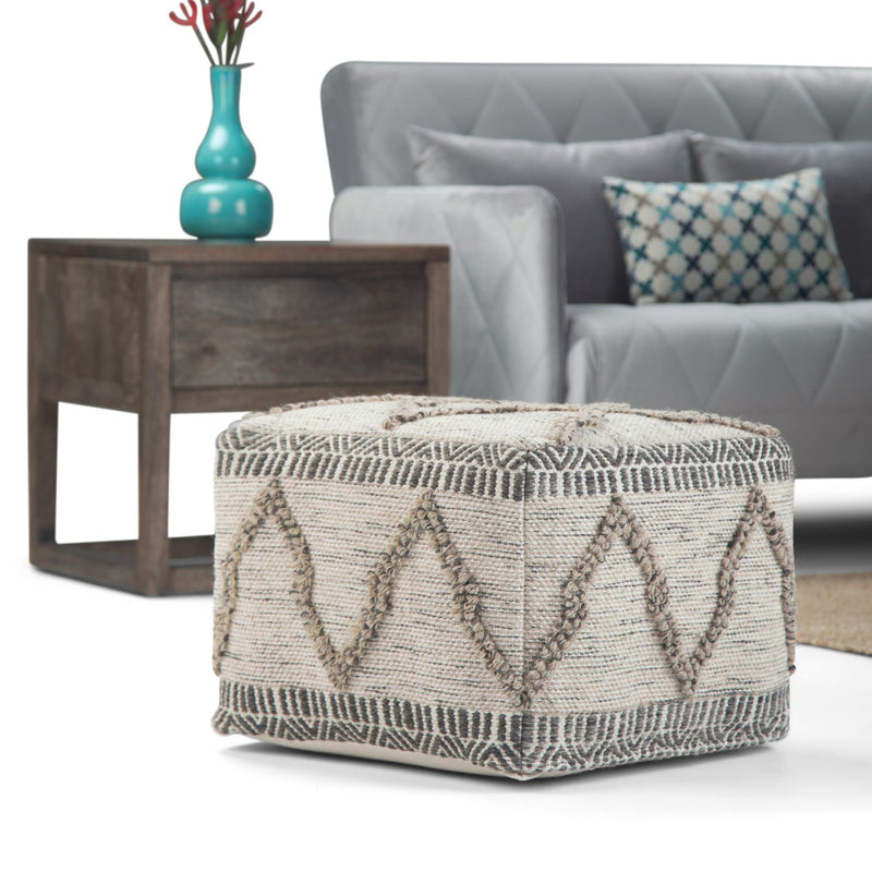Simpli-Home Sweeney upholstered square accent pouf with soft fabric and cushioned top, ideal for living room decor.