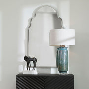 Uttermost Brayden Arch Wall Mirror with nickel finish, featuring a sleek, modern design and a curved frame for elegant wall decor.