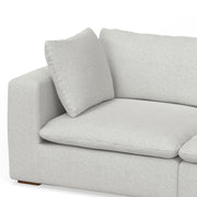 Jasmine handcrafted sofa and ottoman set in a modern living room by Simpli-Home, featuring plush cushions and neutral upholstery.