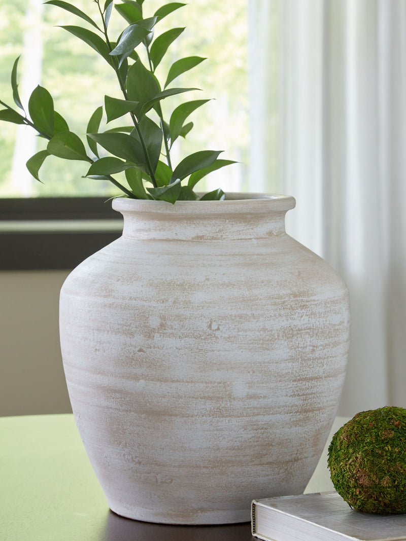 Signature Design by Ashley 12-inch Meadie vase in neutral tones, showcasing its elegant ceramic shape and decorative design.