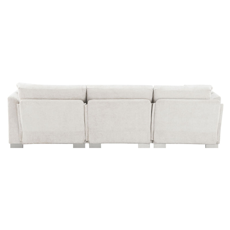Luxurious L-shaped Modern Cloud sectional sofa by Luxe & Co. with oversized chaise and two free pillows, seating four comfortably.