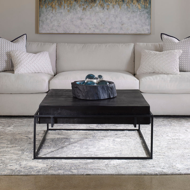 Modern console table by Uttermost with sleek design and metal frame, ideal for entryways or living rooms.