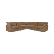Classic Home Caplan modular sectional in neutral fabric, showing multiple connected seating sections and plush cushions.