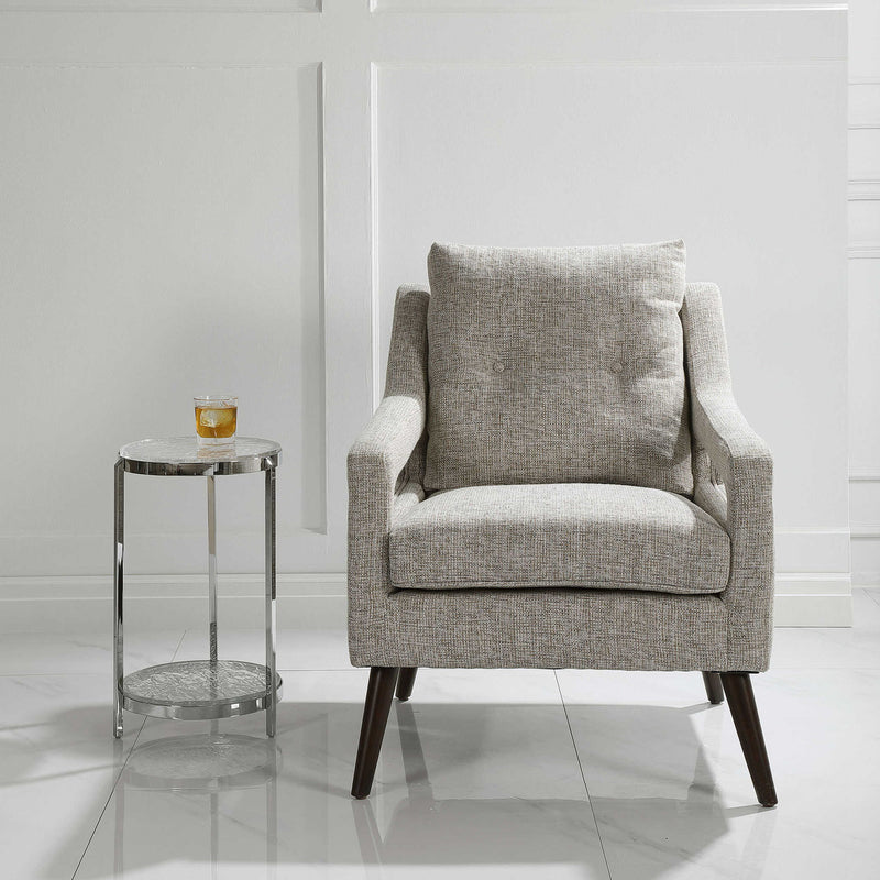 Uttermost O'Brien armchair with plush upholstery and wooden legs, featuring a modern design suitable for living rooms.
