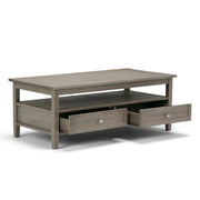 Handcrafted Warm Shaker coffee table by Simpli-Home featuring a wooden surface and sturdy legs in a warm finish.