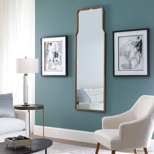 Uttermost Adelasia wall mirror with antiqued gold finish, featuring a decorative frame and reflective surface for elegant wall decor.
