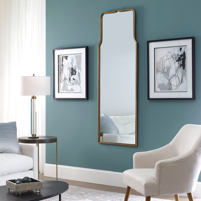 Uttermost Adelasia wall mirror with antiqued gold finish, featuring a decorative frame and reflective surface for elegant wall decor.