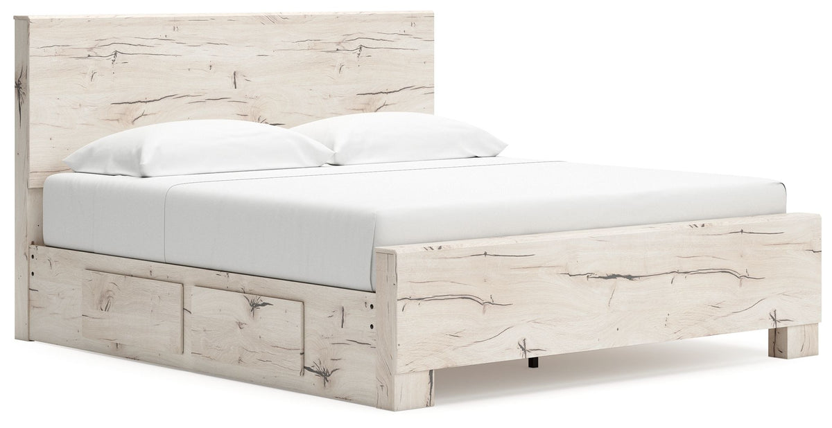 Signature Design by Ashley Lawroy panel storage bed with built-in drawers and a modern wood finish in a bedroom setting.