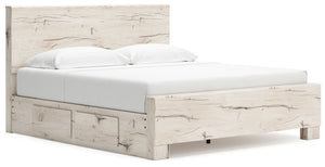 Signature Design by Ashley Lawroy panel storage bed with built-in drawers and a modern wood finish in a bedroom setting.