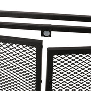 Noble House Samantha iron fireplace screen with a two-door design, featuring decorative metalwork for a classic fireplace protection.