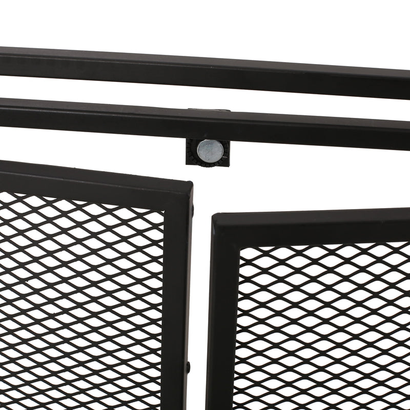 Noble House Samantha iron fireplace screen with a two-door design, featuring decorative metalwork for a classic fireplace protection.