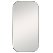 Uttermost Taft wall mirror with a sleek, modern frame reflecting a stylish interior decor image.