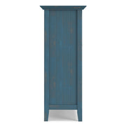 Handcrafted Acadian medium storage cabinet by Simpli-Home featuring wooden doors and a compact, stylish accent cabinet design.