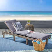 Noble House Ariana wood chaise lounge with a cushioned seat, featuring a sleek design and smooth finish.