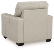Signature Design by Ashley Santorine living room set with stationary chair and ottoman, featuring plush upholstery and modern style.