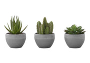 Set of three artificial succulent plants featuring vibrant green, realistic-looking plants by 8th Street for home decor.