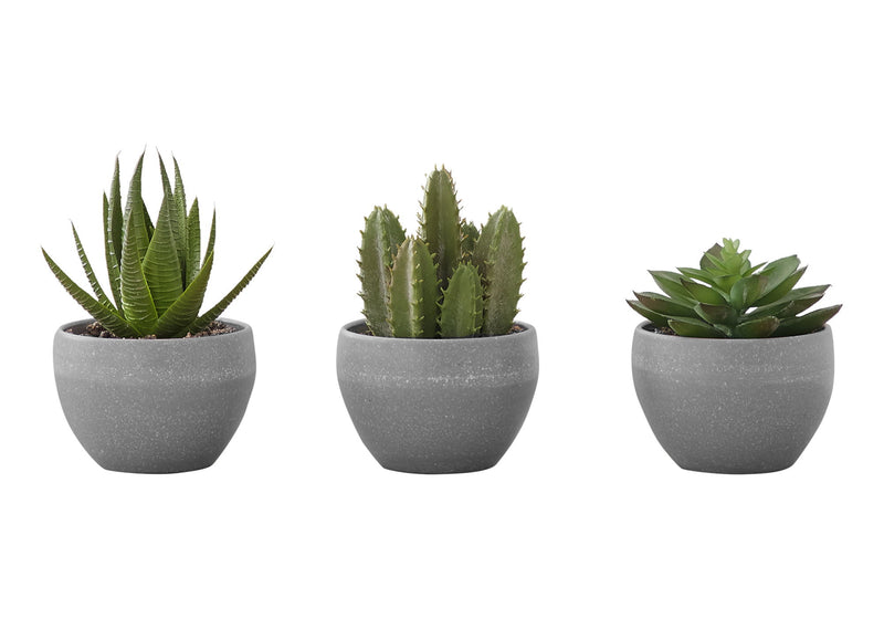 Set of three artificial succulent plants featuring vibrant green, realistic-looking plants by 8th Street for home decor.