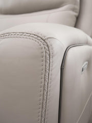 Benchcraft® Gravier reclining sectional sofa with plush cushions and reclining features, shown in a modern living room setting.