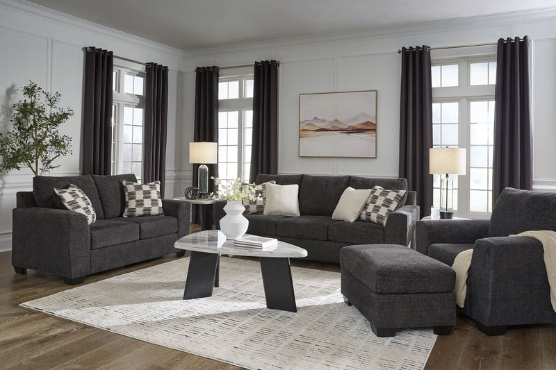 Benchcraft stationary living room chair and ottoman set with plush fabric and modern design, ideal for cozy home seating.