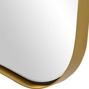 Uttermost Belvoir large wall mirror with antique brass frame, featuring a sleek rectangular design and reflective glass surface.