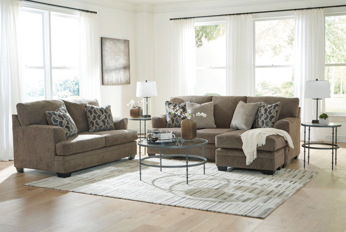 Signature Design by Ashley 3-piece Stonemeade living room set with sofa, loveseat, and armchair in a modern living space.