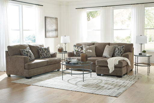 Signature Design by Ashley 3-piece Stonemeade living room set with sofa, loveseat, and armchair in a modern living space.