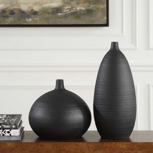Set of two black Uttermost Bower vases with sleek, modern design, perfect for stylish home decor or floral arrangements.