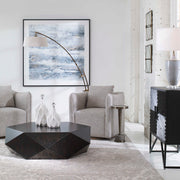 Uttermost Corben swivel chair featuring a plush upholstered seat, sleek metal base, and modern design for contemporary interiors.