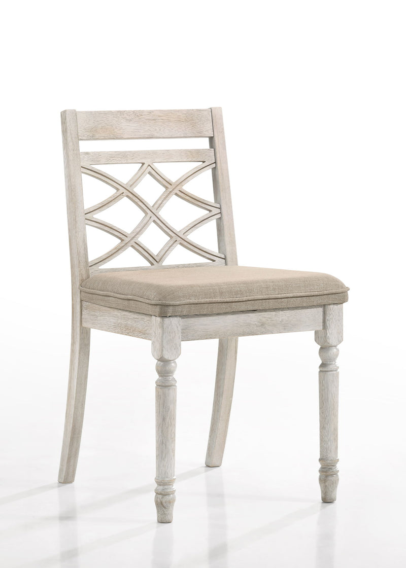 Set of two Lilola Home Havanna wide chairs with cushions in off-white fabric, featuring a modern design and sturdy wooden legs.