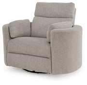Benchcraft® ModMax Luxe swivel glider power recliner in Flint fabric, showing the plush, ergonomic design and swivel base.