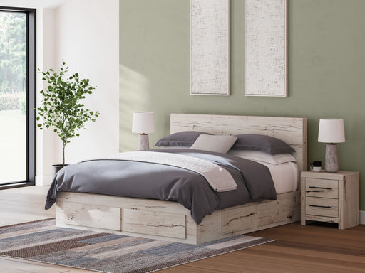 Signature Design by Ashley Lawroy panel bed with built-in storage drawers in a modern bedroom setting.