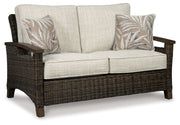 Paradise Trail - Loveseat w/Cushion - Medium Brown - R&R Furniture Gallery (Fountain Valley, CA)