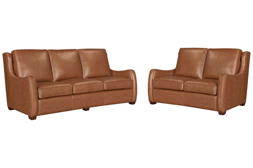 Parker Living Channing cinnamon leather 2-piece living room set with scroll arms and antique brass nail trim, showcasing elegant upholstery.