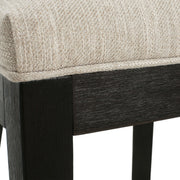Set of two Noble House farmhouse style fabric upholstered side dining chairs with wooden legs and cushioned seats.
