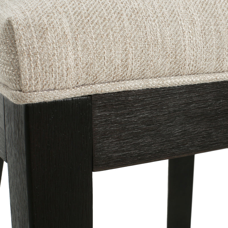 Set of two Noble House farmhouse style fabric upholstered side dining chairs with wooden legs and cushioned seats.